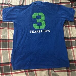 U.S. Polo Assn. Blue Polo Shirt with Green Number